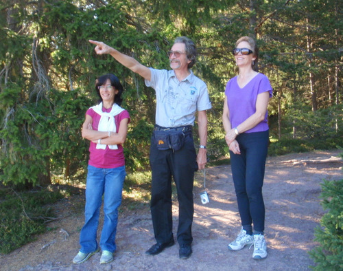 It's not a pose, Ray is pointing out Lana and the Alps.